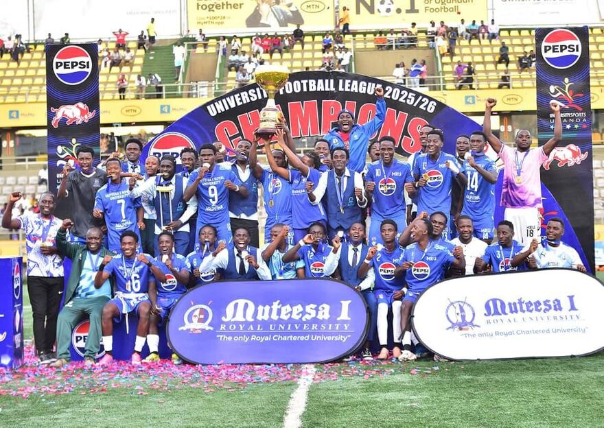The Muteesa I Royal University football team lifting the 2025/26 University Football League trophy