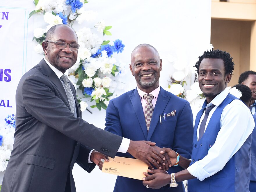 An incoming Guild office-holder receiving his instrument of office at the swearing-in ceremony