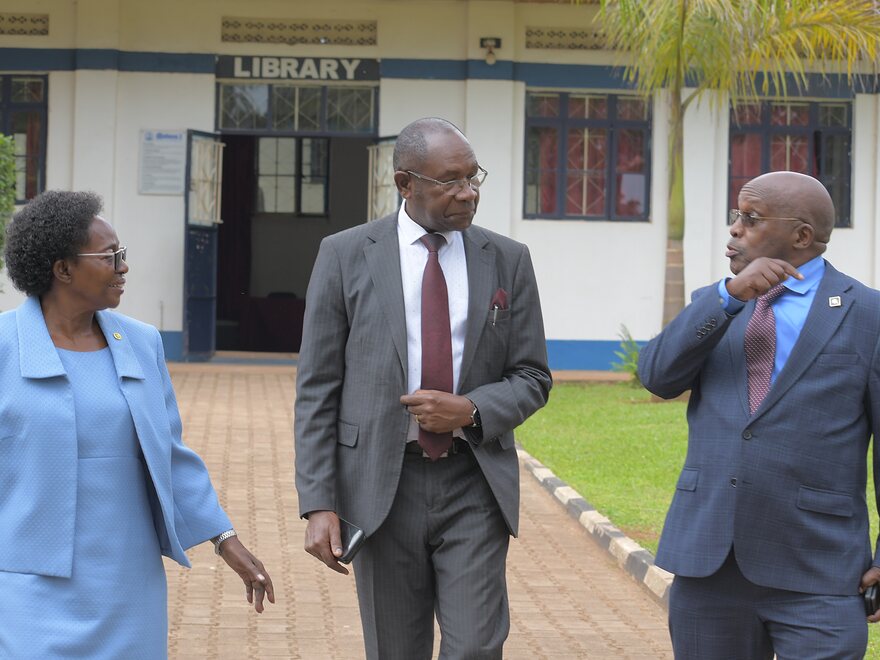 Members of the University walking past the library entrance