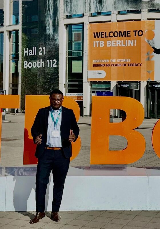 Standing in front of the ITB Berlin entrance sign, Hall 21